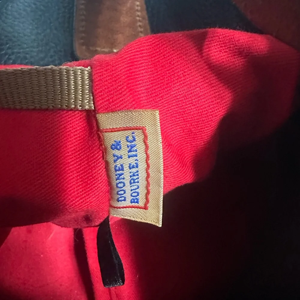 Dooney & Bourke black & brown leather shoulder bag with gold “C” ring/clasp. - Picture 6 of 13